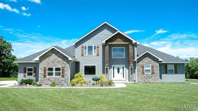 3215 Timber Ridge Rd, Palmyra, MO 63461 - craftsman-style home featuring stone siding and a front lawn