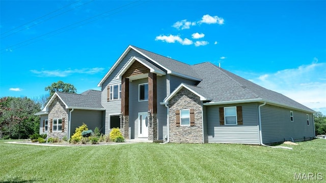 3215 Timber Ridge Rd, Palmyra, MO 63461 - craftsman inspired home featuring stone siding, a front lawn, and a shingled roof
