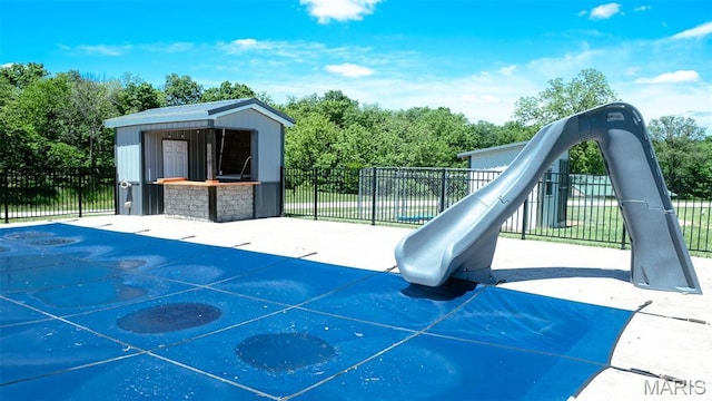 3215 Timber Ridge Rd, Palmyra, MO 63461 - view of playground featuring an outdoor structure and a patio