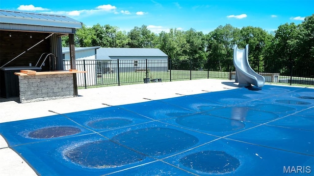3215 Timber Ridge Rd, Palmyra, MO 63461 - view of pool with a water slide and view of wooded area