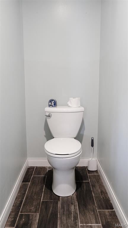 3215 Timber Ridge Rd, Palmyra, MO 63461 - bathroom with wood finished floors and toilet