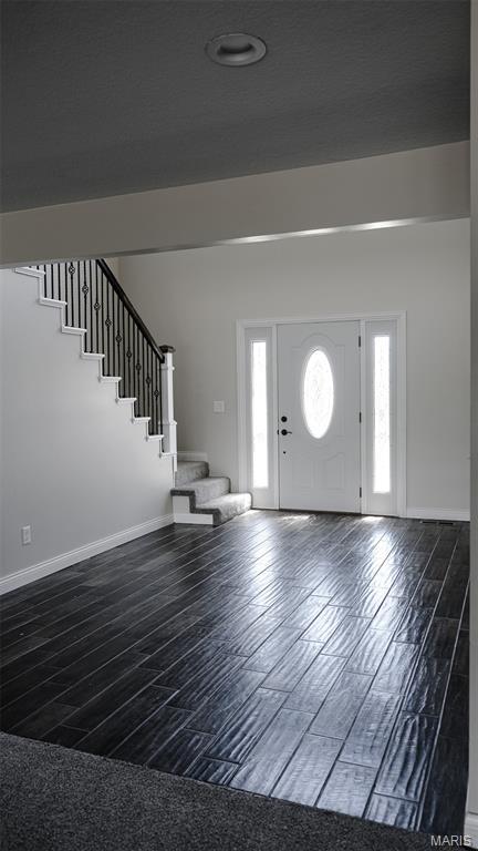 3215 Timber Ridge Rd, Palmyra, MO 63461 - foyer with stairs and wood finished floors