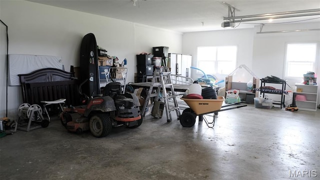 3215 Timber Ridge Rd, Palmyra, MO 63461 - garage featuring a garage door opener