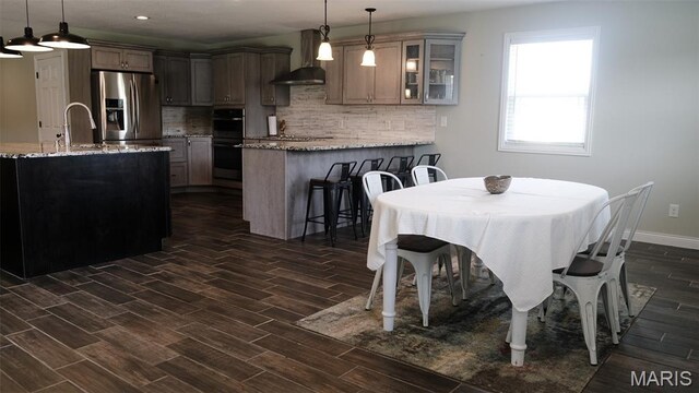 3215 Timber Ridge Rd, Palmyra, MO 63461 - dining area with dark wood-style floors and recessed lighting