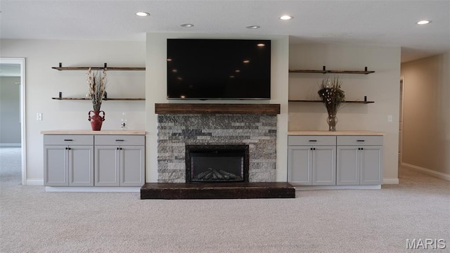 3215 Timber Ridge Rd, Palmyra, MO 63461 - living room featuring light colored carpet, a fireplace, and recessed lighting