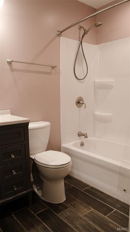 3215 Timber Ridge Rd, Palmyra, MO 63461 - bathroom featuring shower / bath combination, vanity, and wood finish floors