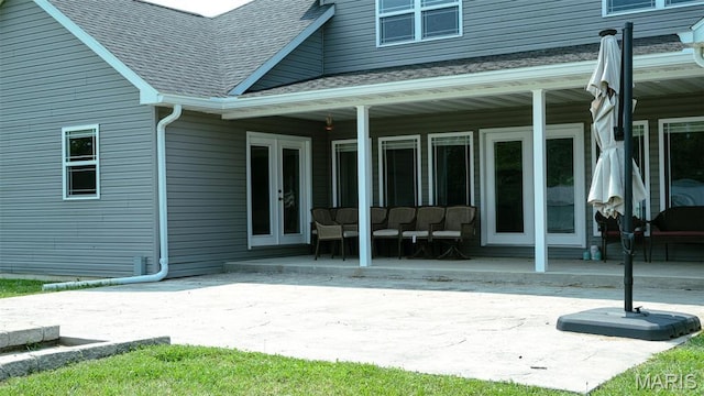 3215 Timber Ridge Rd, Palmyra, MO 63461 - rear view of property with french doors, a shingled roof, and a patio