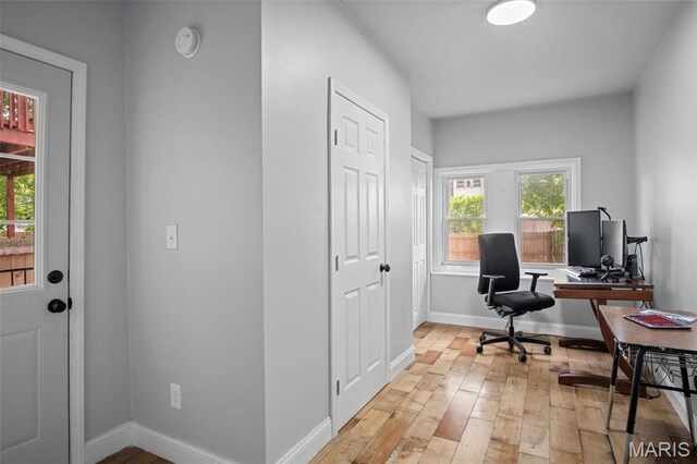 3452 Osage St, Saint Louis, MO 63118 - office space with light wood-style flooring and baseboards