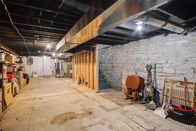 3452 Osage St, Saint Louis, MO 63118 - unfinished below grade area featuring stairs
