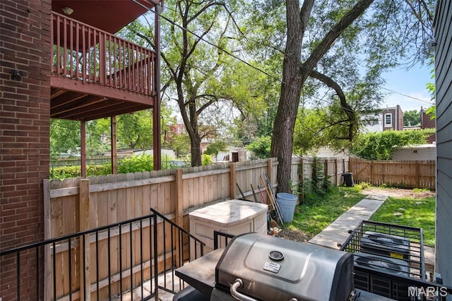 3452 Osage St, Saint Louis, MO 63118 - fenced backyard with a grill