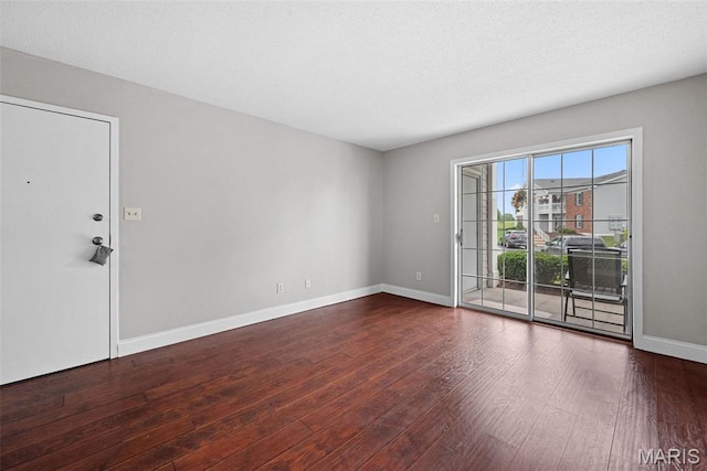 2 Berview Cir Unit H, Saint Louis, MO 63129 - spare room featuring wood finished floors and baseboards