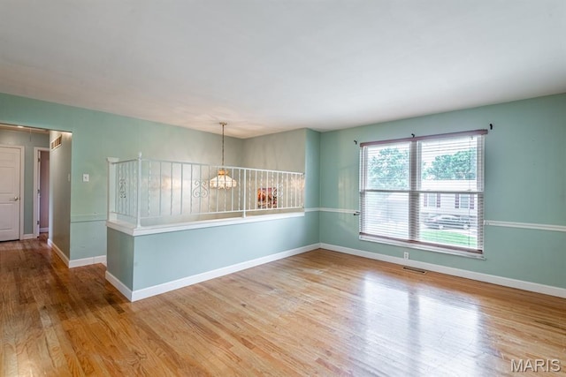1907 Lone Pine Dr, Arnold, MO 63010 - empty room featuring wood finished floors and baseboards