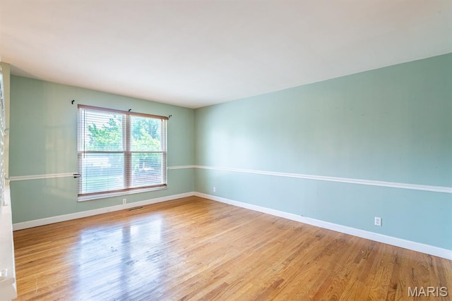 1907 Lone Pine Dr, Arnold, MO 63010 - spare room with wood finished floors