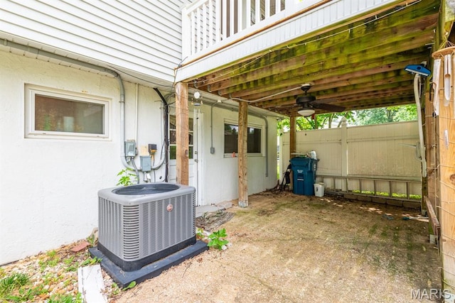 1907 Lone Pine Dr, Arnold, MO 63010 - view of patio featuring a ceiling fan and a carport