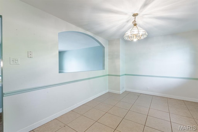 1907 Lone Pine Dr, Arnold, MO 63010 - empty room featuring tile patterned floors and a chandelier