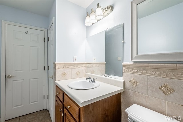 1907 Lone Pine Dr, Arnold, MO 63010 - bathroom featuring vanity, tile walls, and tile patterned flooring