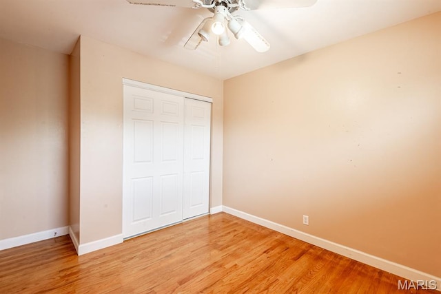 1907 Lone Pine Dr, Arnold, MO 63010 - unfurnished bedroom with a closet, light wood-style flooring, and ceiling fan