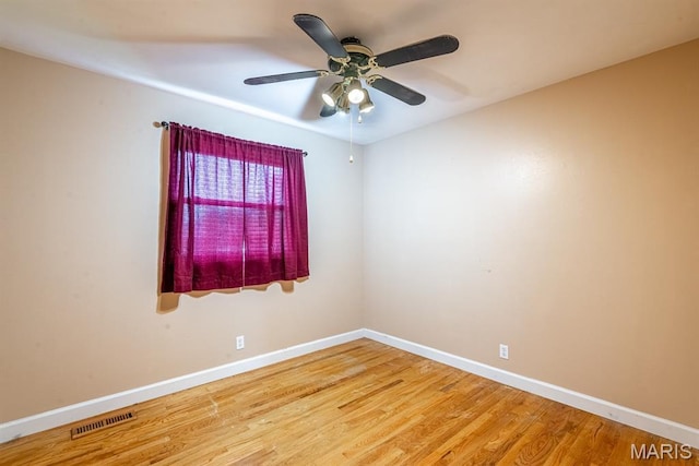1907 Lone Pine Dr, Arnold, MO 63010 - empty room with wood finished floors and a ceiling fan