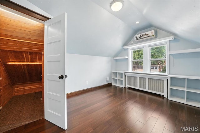 5743 Delor St, Saint Louis, MO 63109 - additional living space with radiator, wood finished floors, and lofted ceiling
