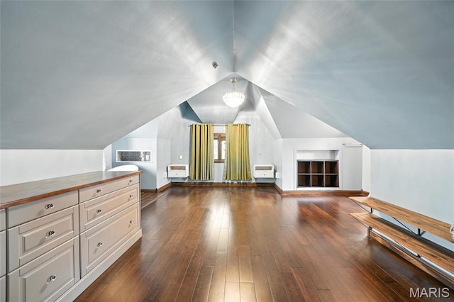 5743 Delor St, Saint Louis, MO 63109 - additional living space featuring dark wood-style floors and vaulted ceiling