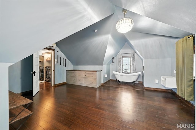 5743 Delor St, Saint Louis, MO 63109 - additional living space with vaulted ceiling, hardwood / wood-style flooring, and a chandelier