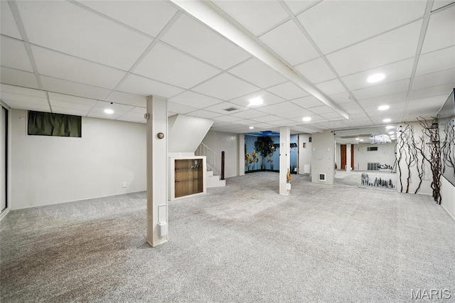 5743 Delor St, Saint Louis, MO 63109 - finished below grade area featuring stairs, carpet, and recessed lighting