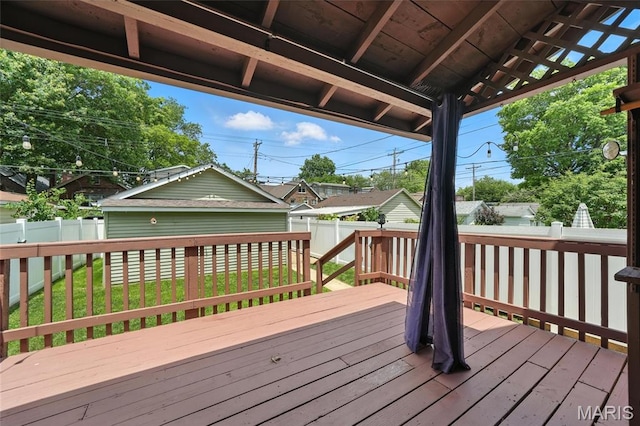 5743 Delor St, Saint Louis, MO 63109 - wooden deck featuring a fenced backyard and an outdoor structure