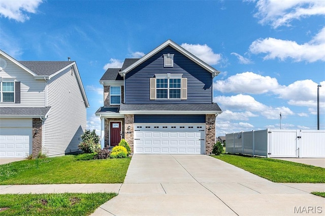 502 Summer Glen Ln, Saint Charles, MO 63301 - traditional-style house featuring a gate, a garage, and concrete driveway