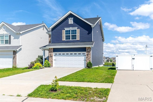 502 Summer Glen Ln, Saint Charles, MO 63301 - traditional-style home featuring a gate, an attached garage, driveway, and a front yard
