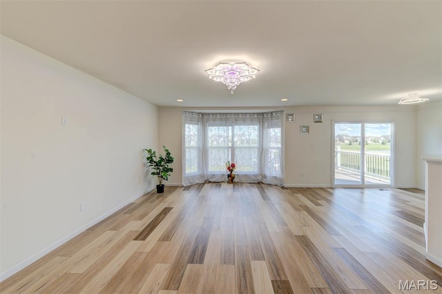 502 Summer Glen Ln, Saint Charles, MO 63301 - spare room with light wood-style flooring and recessed lighting