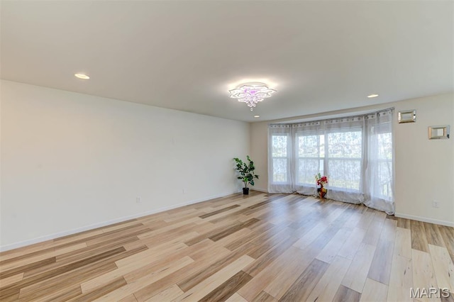 502 Summer Glen Ln, Saint Charles, MO 63301 - spare room with light wood-style flooring and recessed lighting
