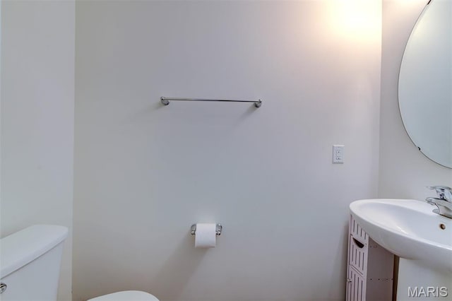 502 Summer Glen Ln, Saint Charles, MO 63301 - bathroom with toilet and a sink