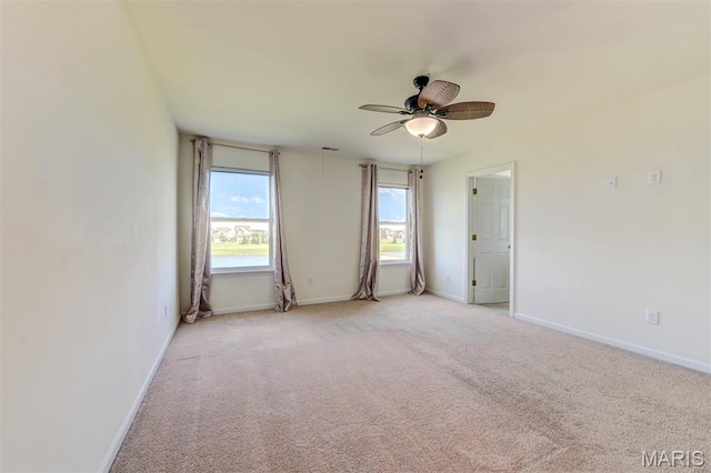 502 Summer Glen Ln, Saint Charles, MO 63301 - spare room featuring light carpet and ceiling fan