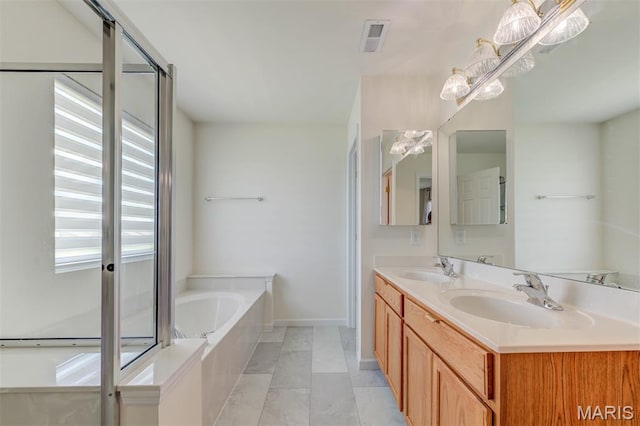 502 Summer Glen Ln, Saint Charles, MO 63301 - bathroom featuring a bath and double vanity