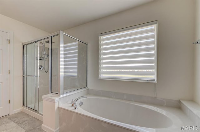 502 Summer Glen Ln, Saint Charles, MO 63301 - bathroom with a bath and a shower stall