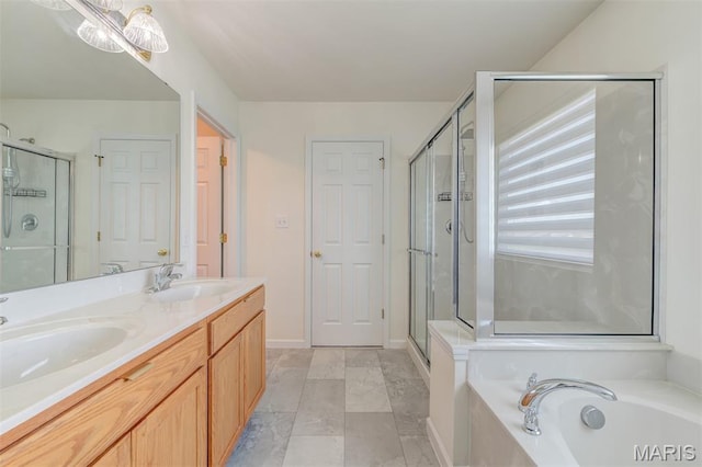 502 Summer Glen Ln, Saint Charles, MO 63301 - bathroom featuring a bath, double vanity, and a stall shower