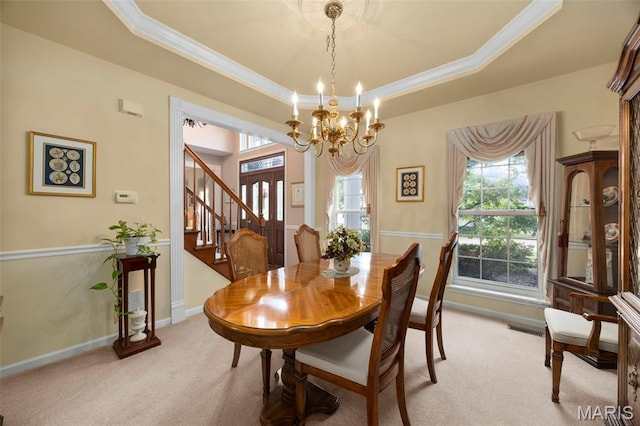 16368 Cherry Orchard Dr, Grover, MO 63040 - dining room with light colored carpet, ornamental molding, stairs, a chandelier, and a tray ceiling