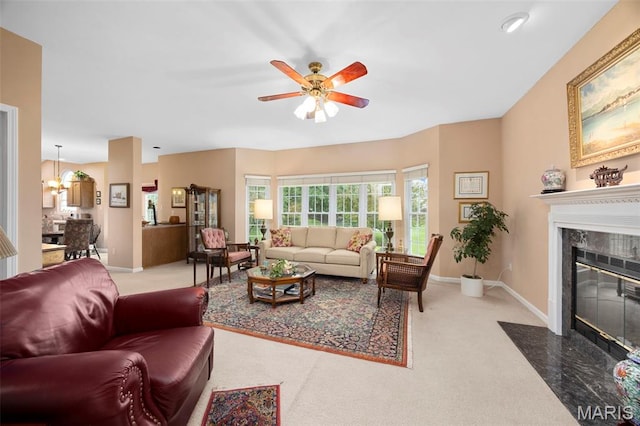 16368 Cherry Orchard Dr, Grover, MO 63040 - carpeted living area with a ceiling fan and a fireplace