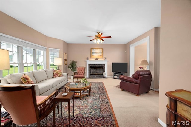 16368 Cherry Orchard Dr, Grover, MO 63040 - living room featuring carpet flooring, ceiling fan, and a high end fireplace