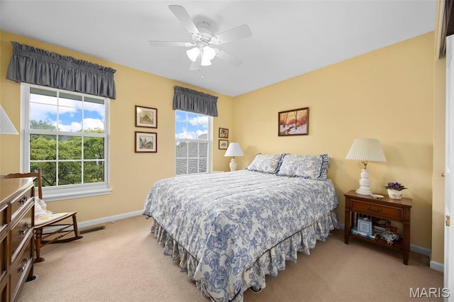 16368 Cherry Orchard Dr, Grover, MO 63040 - carpeted bedroom featuring multiple windows and ceiling fan