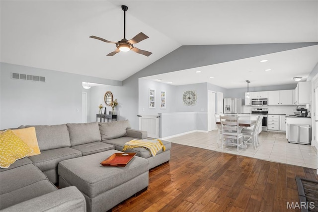 2607 Riley Paul Ct, Ofallon, MO 63368 - living room featuring a ceiling fan, light wood-style flooring, lofted ceiling, and recessed lighting