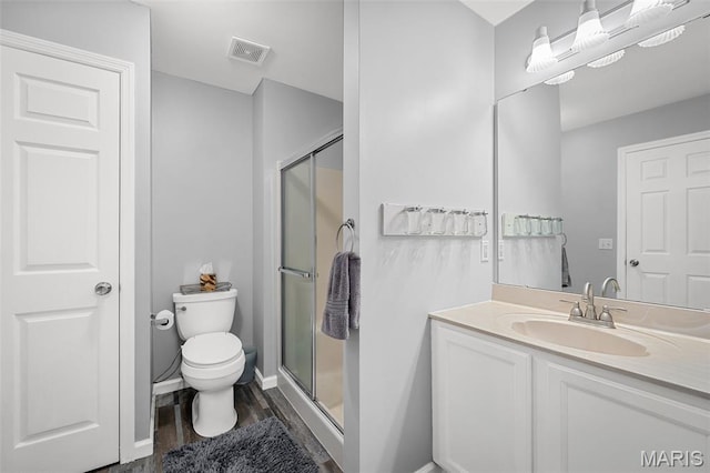 2607 Riley Paul Ct, Ofallon, MO 63368 - bathroom with wood finished floors, a shower stall, and vanity