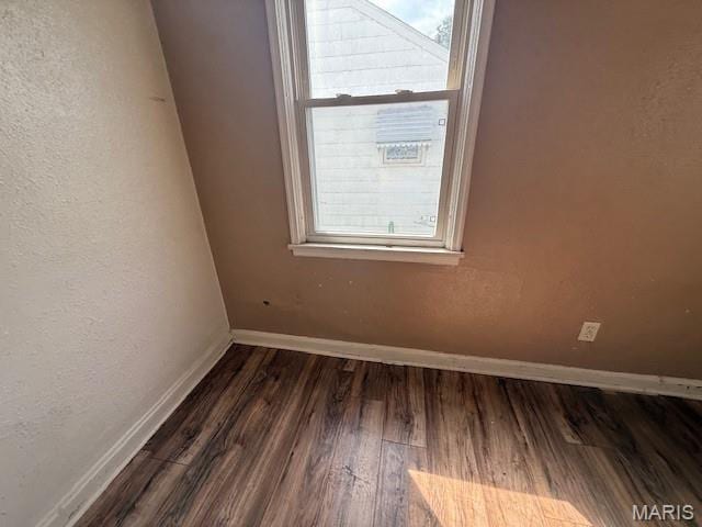 7446 Calvin Ave, Country Club Hills, MO 63136 - spare room featuring wood finished floors