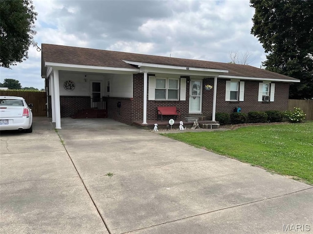 746 State Highway P, New Madrid, MO 63869 - ranch-style home featuring driveway, brick siding, a carport, and a shingled roof