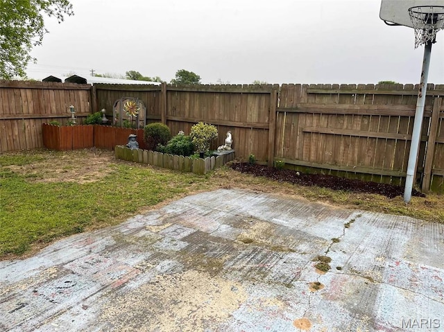 746 State Highway P, New Madrid, MO 63869 - fenced backyard with a patio