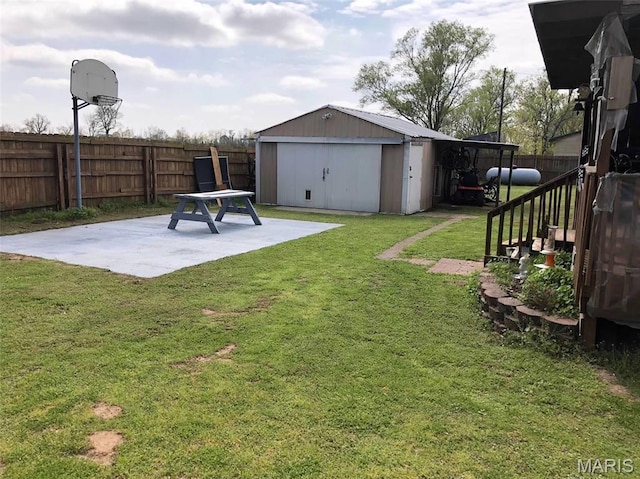 746 State Highway P, New Madrid, MO 63869 - fenced backyard with a patio area and a storage unit