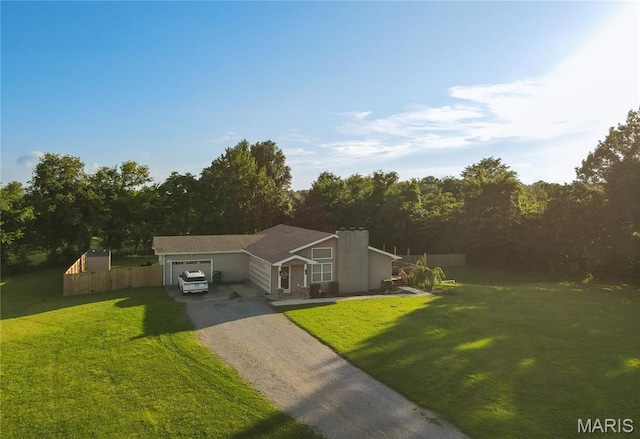 16533 Chateau Ln, Dexter, MO 63841 - view of front of home with driveway and an attached garage