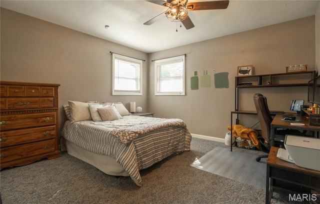 16533 Chateau Ln, Dexter, MO 63841 - carpeted bedroom with a desk and a ceiling fan
