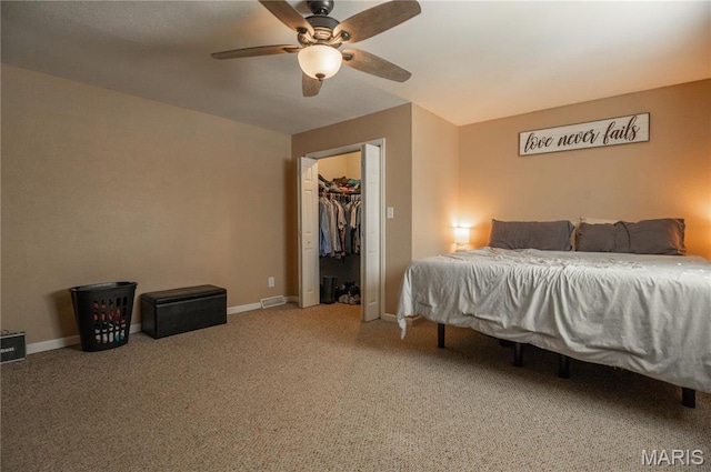 16533 Chateau Ln, Dexter, MO 63841 - carpeted bedroom with baseboards and a ceiling fan