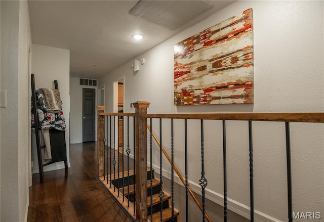 16533 Chateau Ln, Dexter, MO 63841 - hallway featuring wood finished floors, recessed lighting, and an upstairs landing